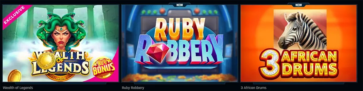 Online casino slot game thumbnails featuring Wealth of Legends, Ruby Robbery, and 3 African Drums displayed in a colorful casino game lobby interface.